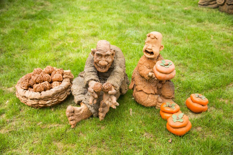 Asian China, Beijing, agriculture Carnival,Clay sculpture, grandfather and grandson royalty free stock photos Asian China, Beijing, agriculture Carnival,Clay sculpture, grandfather and grandson royalty free stock photos